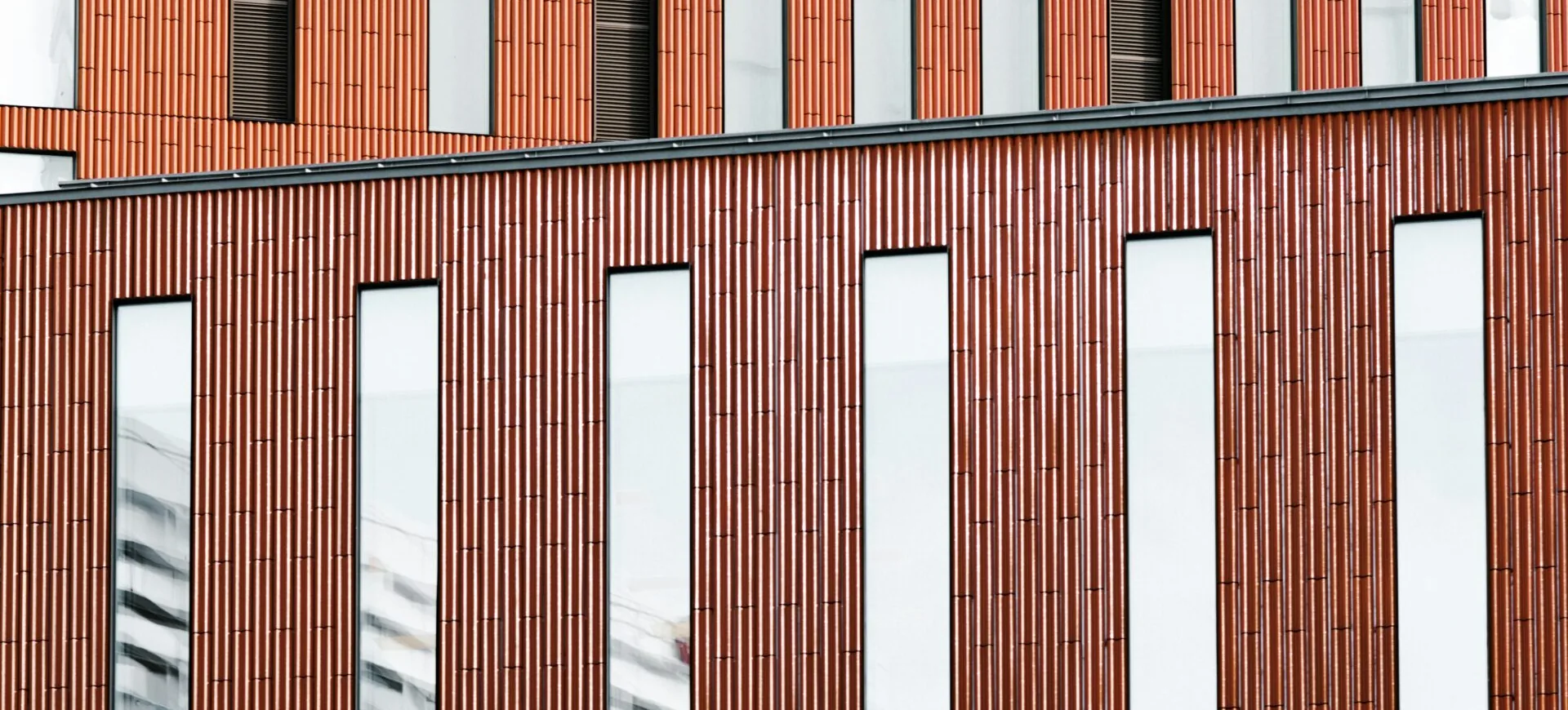 Brick facade with tall narrow windows