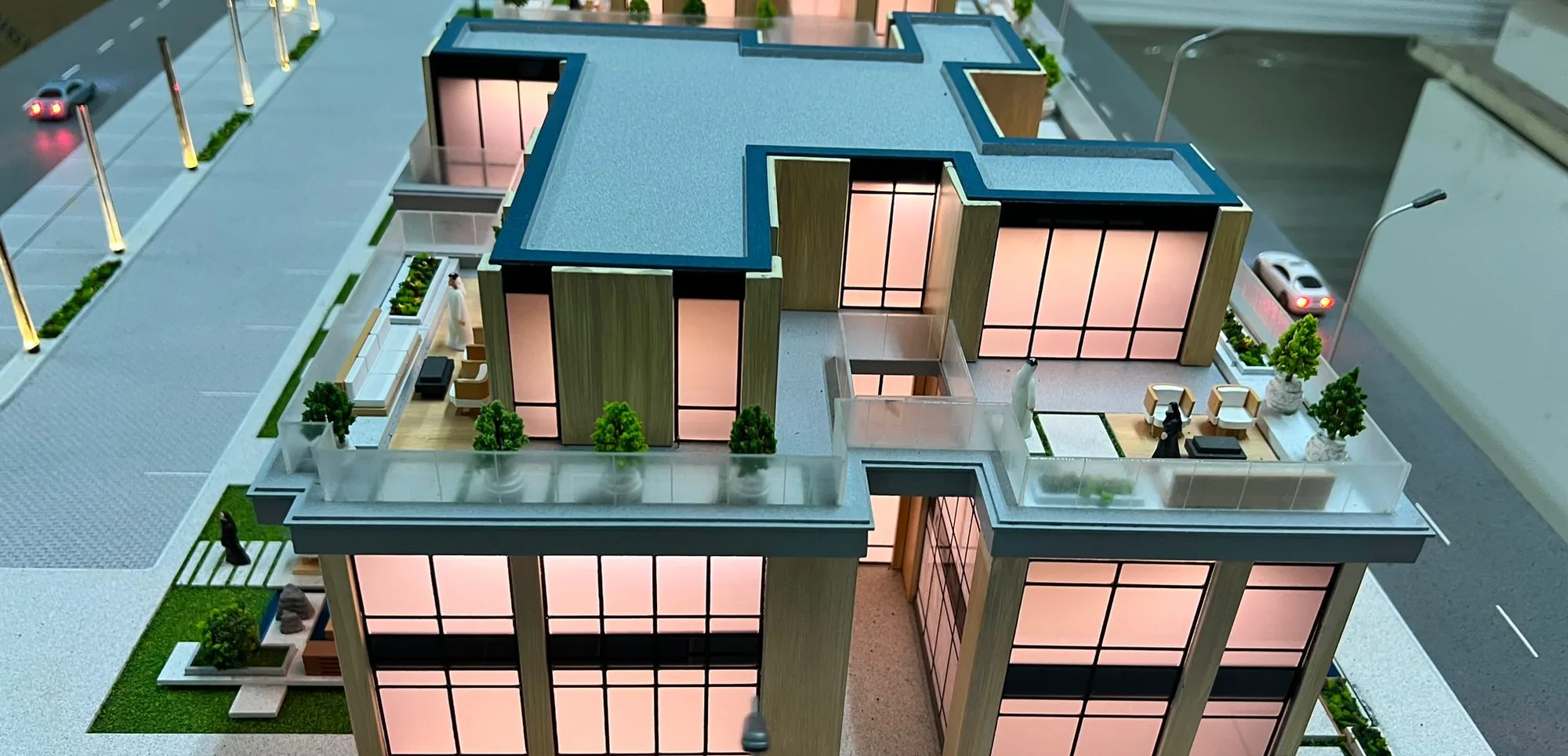 Lit scale model of a villa compound