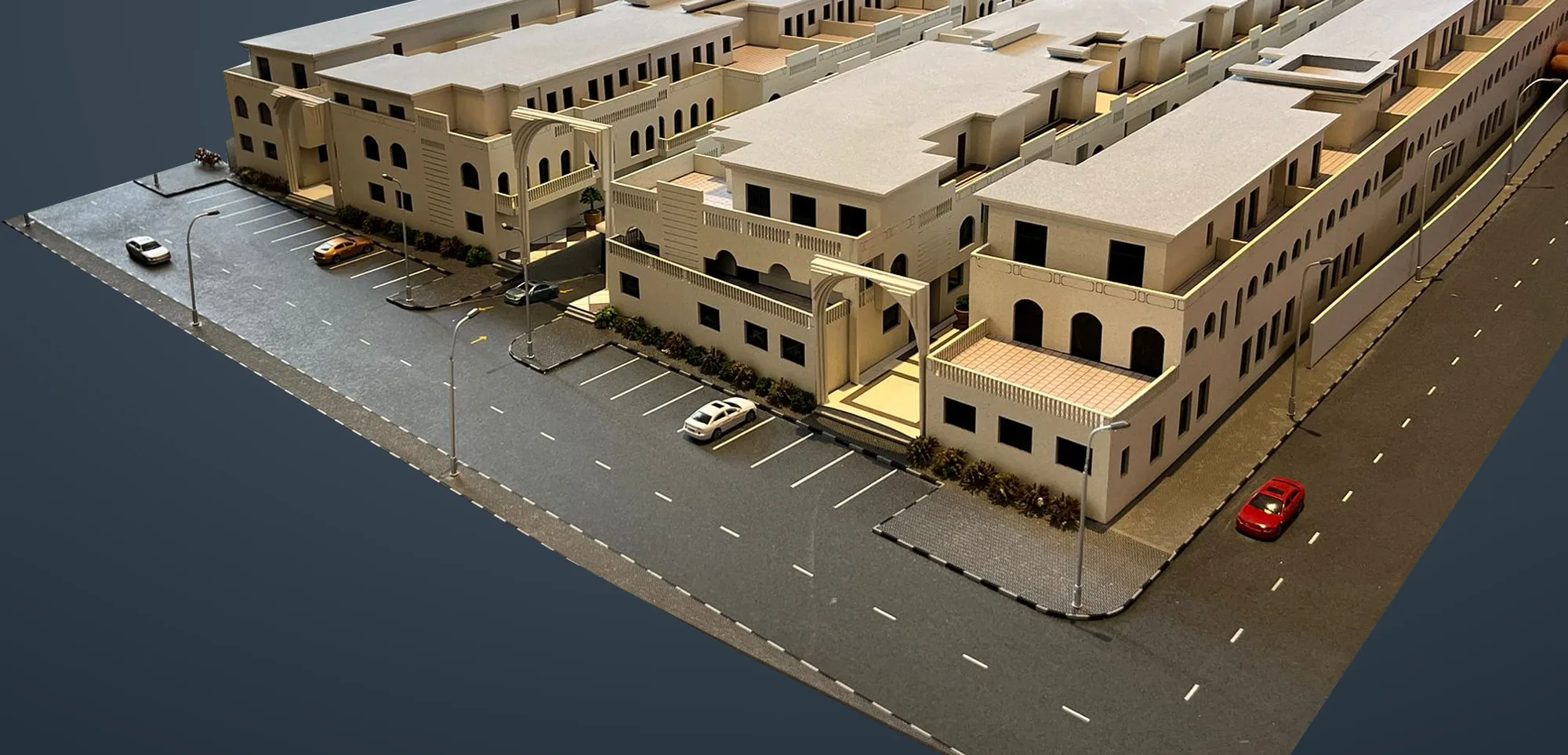 Townhouse development model on a dark backdrop