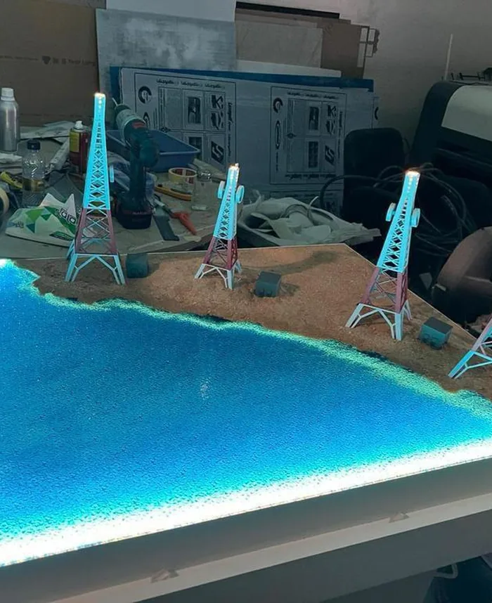 Coastal development model with illuminated water