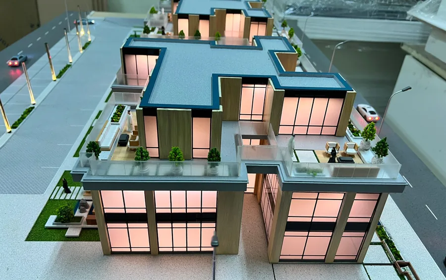 Lit scale model of a villa compound